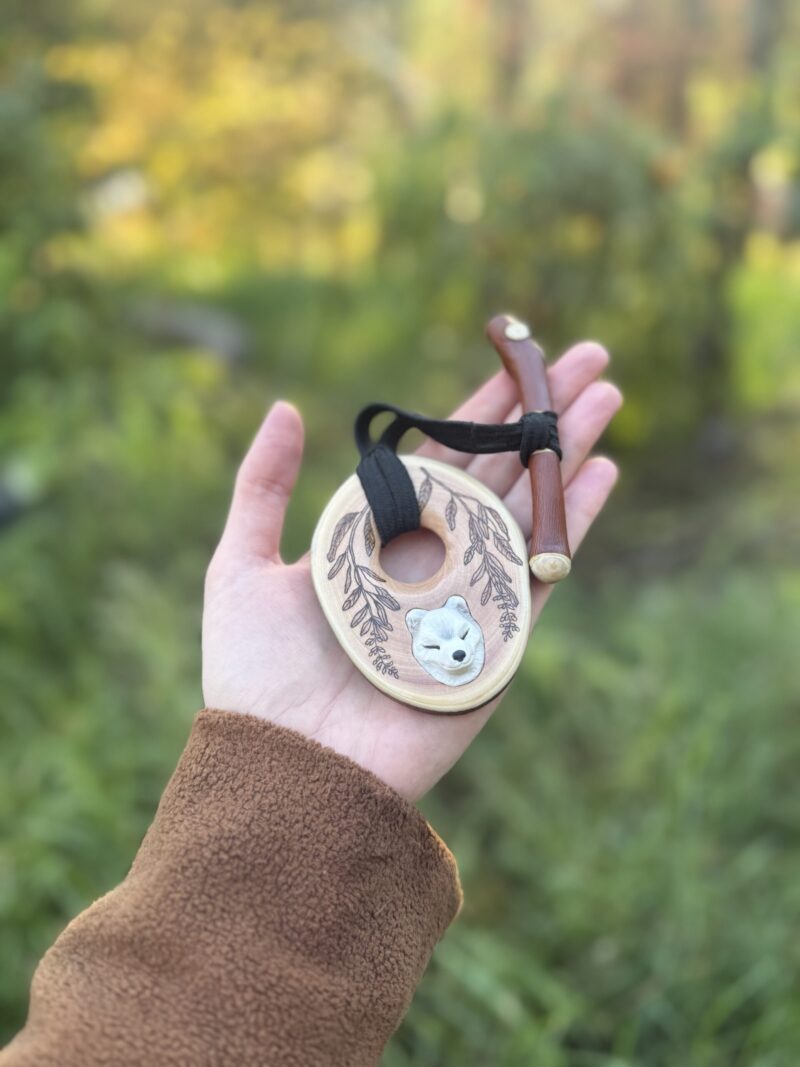 Madrone wooden toggle with polymer wolf design - finished with lacquer